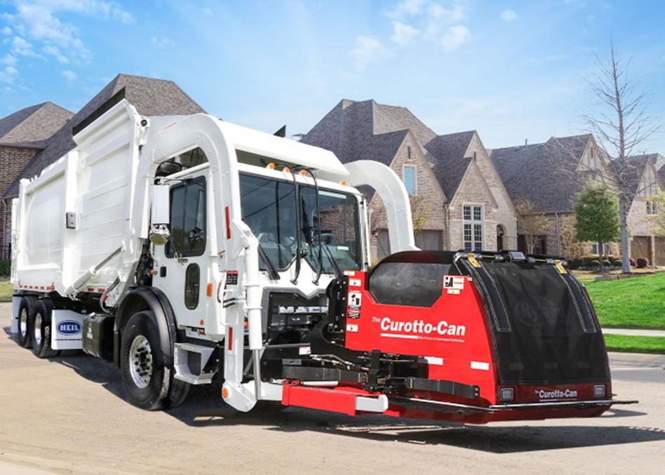 Heil front load garbage truck equipped with a Curotto Can attachment